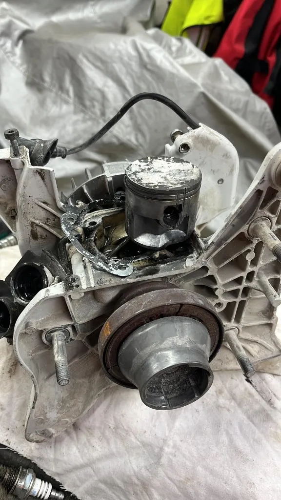 Rebuilt petrol lawnmower piston and cylinder at PGT Repairs workshop in Hyde